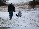 Sledding on our dusting- 1st of Jan.
